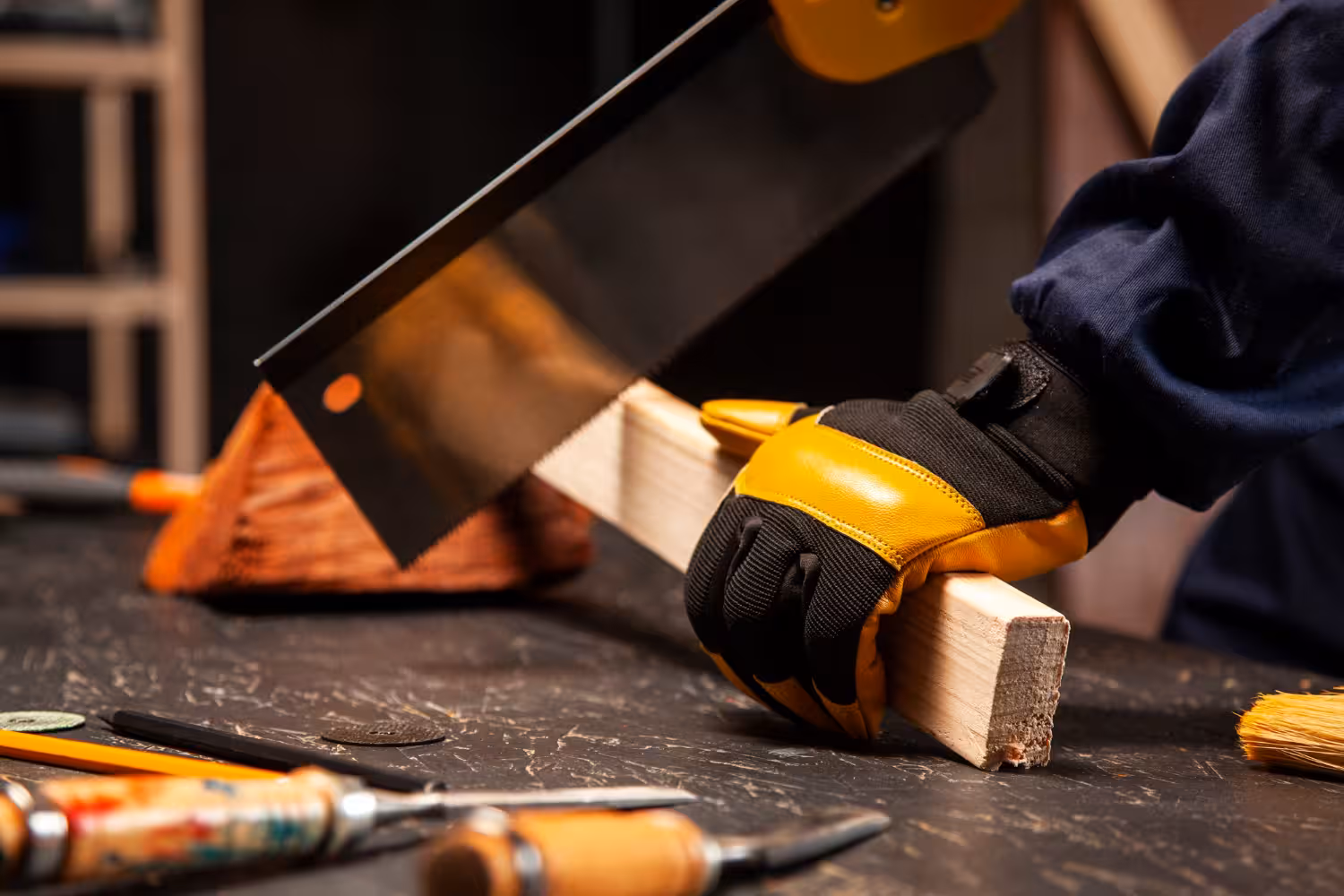 Man in black sweatpants using DEWALT circular saw and cutting a wood plank